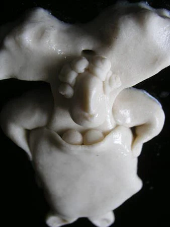Finished mould of an angel, made of dough, uncooked